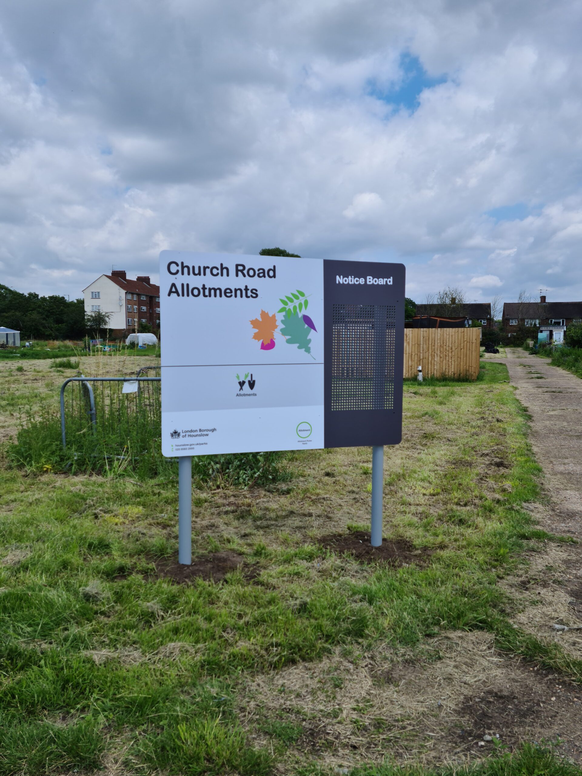 Business and wayfinding signs mounted on posts for visibility at entrances and sites