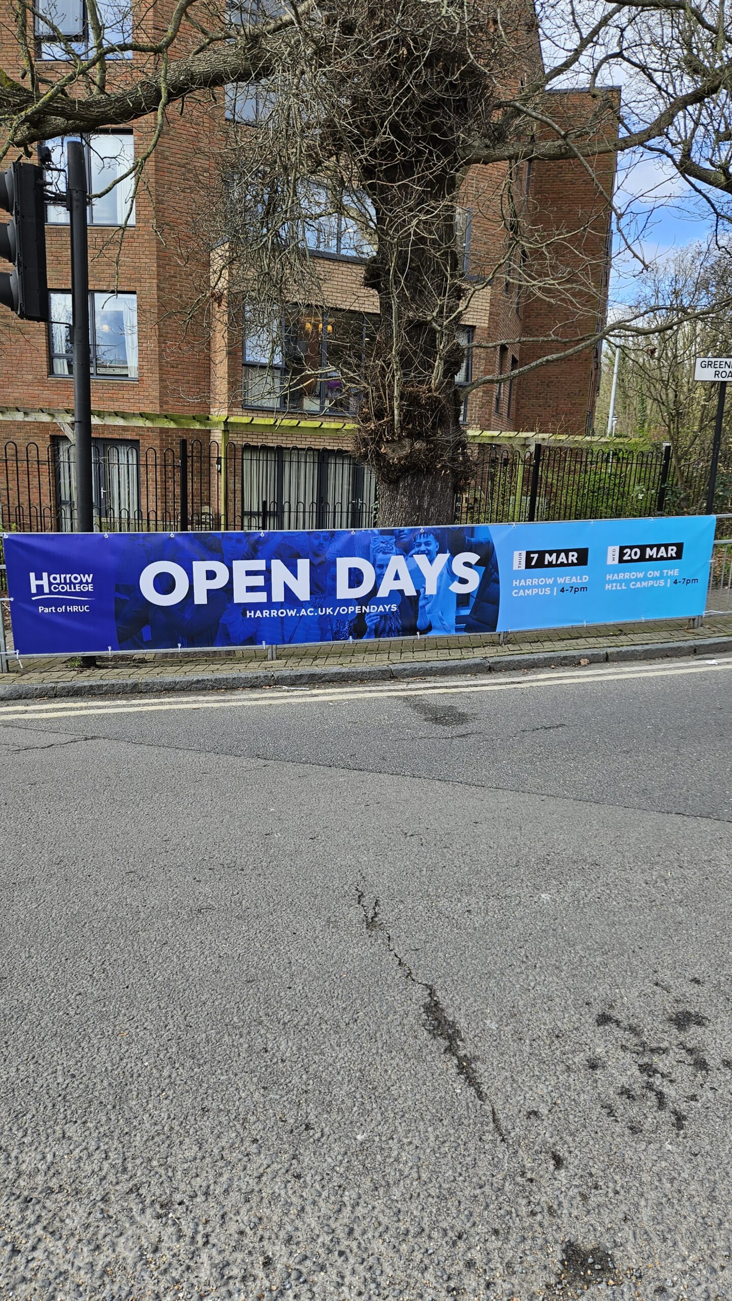 PVC and mesh vinyl banner installed outdoors for local business promotion in Aylesbury