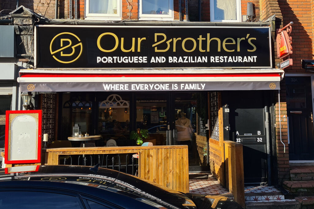 Restaurant sign with family theme