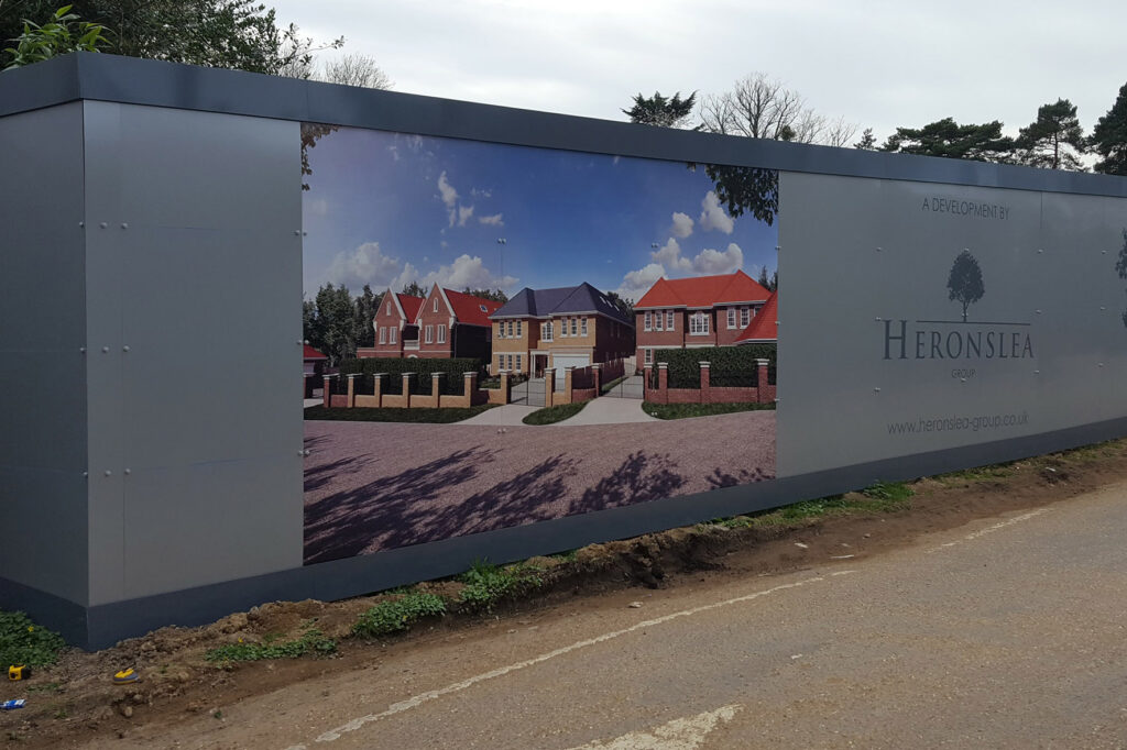 Hoarding panels fitted at contruction site of new houses