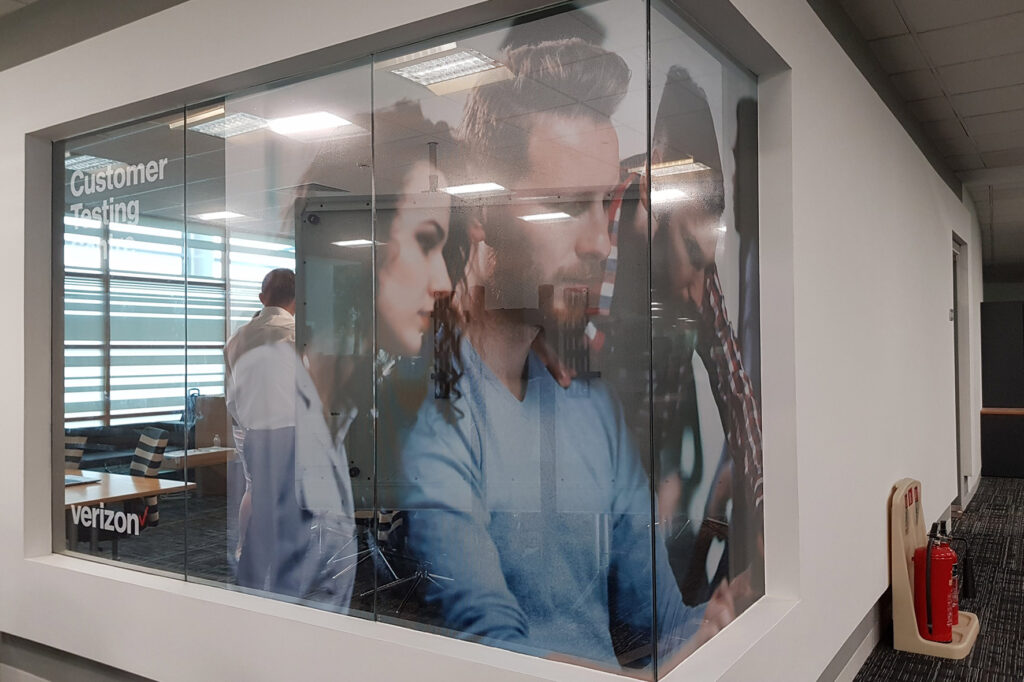 Demo room glass fitted with one way vision vinyl